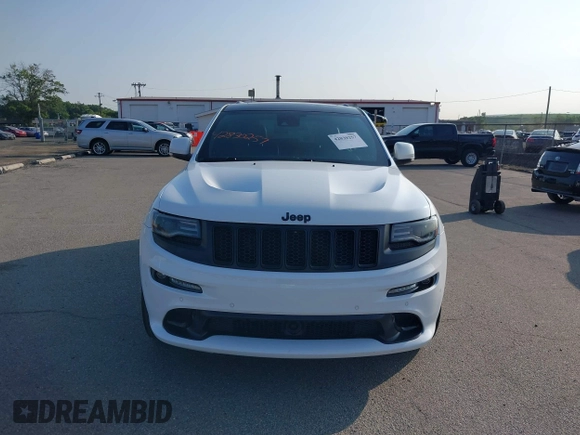 2016 Jeep Grand Cherokee SRT with VIN 1C4RJFDJ3GC503878, listed as a IAAI auction lot 42830257 with 82,661 mi miles and . Bid and sale history available at DreamBid. Image 12.