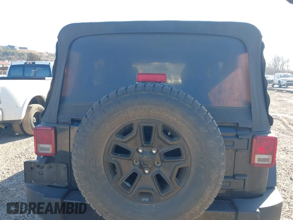 2016 Jeep Wrangler Unlimited Sport with VIN 1C4BJWDG0GL123581, listed as a IAAI auction lot 41426577 with 102,301 mi miles and . Bid and sale history available at DreamBid. Image 16.