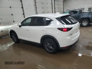 2019 Mazda CX-5 Touring with VIN JM3KFBCM1K0697500, listed as a Copart auction lot 46460735 with 69,412 mi miles and Salvage Title. Bid and sale history available at carsss.com. Image 2.