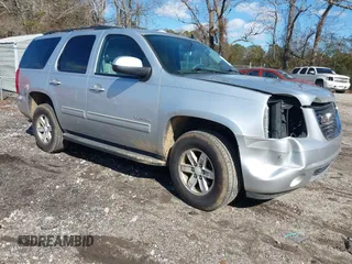 2012 GMC Yukon SLT with VIN 1GKS2CE02CR133683, listed as a IAAI auction lot 41375435 with 197,634 mi miles. Bid and sale history available at carsss.com. Image 1.