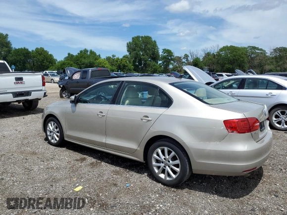 2013 Volkswagen Jetta SE z VIN 3VWDP7AJ6DM212821, wystawiony jako Copart lot #63791895 z przebiegiem 95 119 mil mil oraz Szkoda całkowita • Salvage title. Historia ofert i sprzedaży dostępna na DreamBid. Obrazek 2.