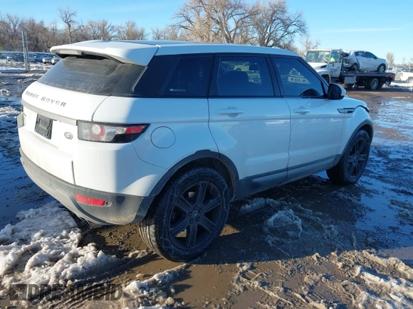 2015 Land Rover Range Rover Evoque Pure Plus with VIN SALVP2BG7FH991529, listed as a IAAI auction lot 41647483 with 76,406 mi miles and . Bid and sale history available at DreamBid. Image 4.