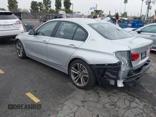 2017 BMW 3 Series 330e iPerformance with VIN WBA8E1C59HK480327, listed as a IAAI auction lot 41809395 with 74,919 mi miles. Bid and sale history available at carsss.com. Image 3.