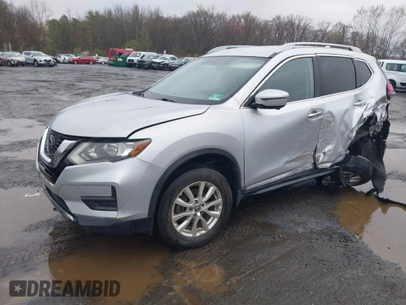 2018 Nissan Rogue SV with VIN 5N1AT2MVXJC800314, listed as a IAAI auction lot 42021347 with 27,129 mi miles and . Bid and sale history available at DreamBid. Image 2.