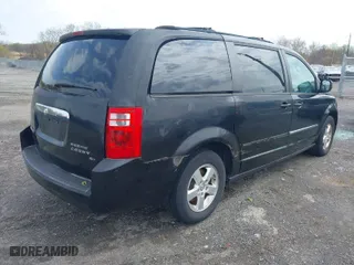2010 Dodge Grand Caravan SXT with VIN 2D4RN5D11AR201781, listed as a IAAI auction lot 42028688 with 147,563 mi miles. Bid and sale history available at carsss.com. Image 4.