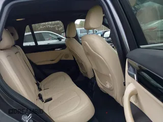 2017 BMW X1 xDrive28i with VIN WBXHT3Z39H4A57753, listed as a IAAI auction lot 41726790 with 52,509 mi miles. Bid and sale history available at carsss.com. Image 8.