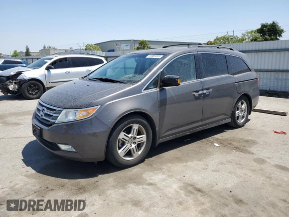 2012 Honda Odyssey Touring с VIN 5FNRL5H9XCB109229, выставлен на аукционе Copart как лот 59885895 с пробегом 153 668 миль миль и Чистый • Clean title. История ставок и продаж доступна на DreamBid. Изображение 1.