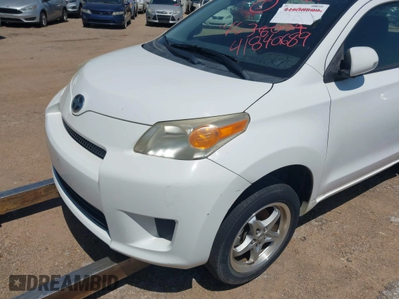 2008 Scion xD with VIN JTKKU104X8J001399, listed as a IAAI auction lot 41840689 with 220,468 mi miles. Bid and sale history available at carsss.com. Image 6.