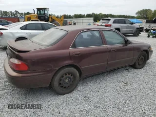 2000 Mazda 626 LX with VIN 1YVGF22D8Y5126950, listed as a Copart auction lot 69440124 with 208,584 mi miles and Salvage Title. Bid and sale history available at carsss.com. Image 3.