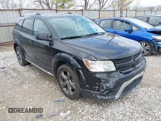 2015 Dodge Journey Crossroad with VIN 3C4PDDGGXFT639673, listed as a IAAI auction lot 41915884 with 199,654 mi miles. Bid and sale history available at carsss.com. Image 1.