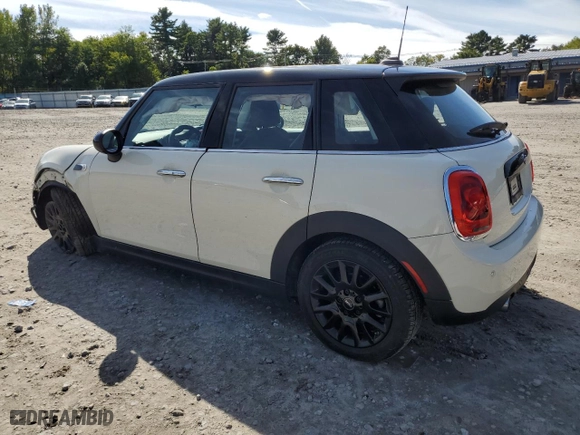 2019 MINI Hardtop 4 Door Cooper with VIN WMWXU1C56K2H74308, listed as a Copart auction lot 73110974 with 76,307 mi miles and Salvage Title. Bid and sale history available at carsss.com. Image 2.