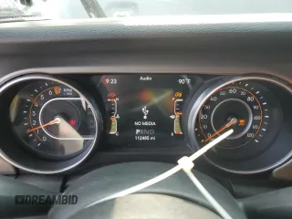 2018 Jeep Wrangler Unlimited Sport S with VIN 1C4HJXDG0JW281103, listed as a Copart auction lot 60400565 with 112,485 mi miles and Salvage title. Bid and sale history available at DreamBid. Image 9.
