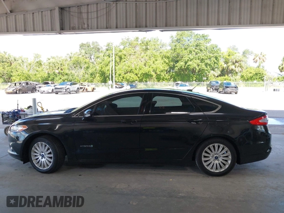2015 Ford Fusion SE Hybrid with VIN 3FA6P0LU5FR102185, listed as a IAAI auction lot 42453553 with 172,230 mi miles and . Bid and sale history available at DreamBid. Image 14.
