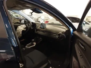 2016 Scion iA z VIN 3MYDLBZV5GY103533, wystawiony jako IAAI lot #41756270 z przebiegiem 59 290 mil mil oraz . Historia ofert i sprzedaży dostępna na DreamBid. Obrazek 5.