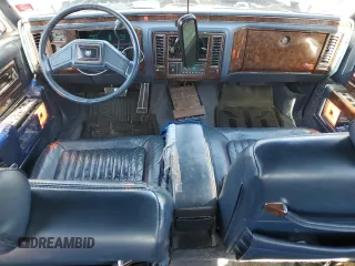 1992 Cadillac Brougham z VIN 1G6DW54E7NR707492, wystawiony jako Copart lot #79950214 z przebiegiem 263 624 mil mil oraz Tytuł czysty. Historia ofert i sprzedaży dostępna na DreamBid. Obrazek 8.
