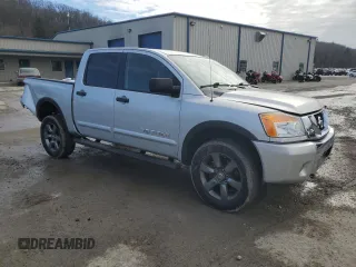 2015 Nissan Titan Pro-4X with VIN 1N6AA0EC1FN512072, listed as a Copart auction lot 85733174 with 92,460 mi miles and Salvage title. Bid and sale history available at DreamBid. Image 4.