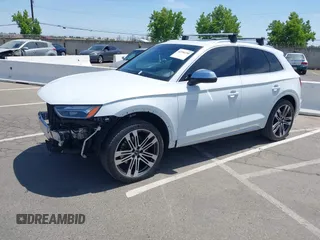 2021 Audi SQ5 Premium Plus with VIN WA1B4AFY2M2035563, listed as a IAAI auction lot 42396190 with 40,117 mi miles and . Bid and sale history available at DreamBid. Image 2.