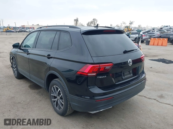 2021 Volkswagen Tiguan S with VIN 3VV1B7AX4MM025586, listed as a IAAI auction lot 41889996 with 21,777 mi miles and . Bid and sale history available at DreamBid. Image 3.