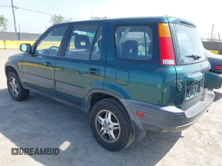 1999 Honda CR-V EX with VIN JHLRD1866XC028200, listed as a IAAI auction lot 42040657 with 207,397 mi miles. Bid and sale history available at carsss.com. Image 3.
