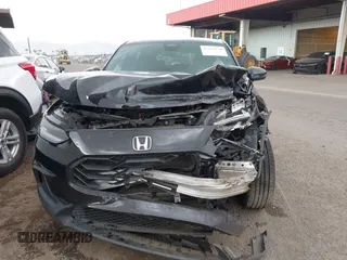 2024 Honda HR-V Sport z VIN 3CZRZ1H55RM707358, wystawiony jako IAAI lot #42190730 z przebiegiem 39 368 mil mil oraz . Historia ofert i sprzedaży dostępna na DreamBid. Obrazek 6.