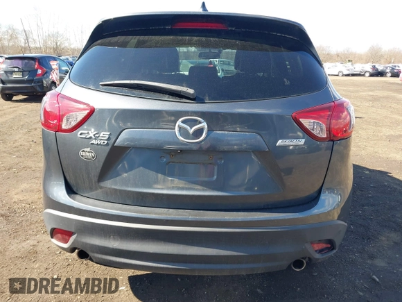 2013 Mazda CX-5 Grand Touring with VIN JM3KE4DE1D0164488, listed as a IAAI auction lot 41683326 with 129,989 mi miles. Bid and sale history available at carsss.com. Image 16.