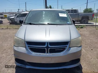 2013 Dodge Grand Caravan SE with VIN 2C4RDGBG0DR702913, listed as a IAAI auction lot 42007786 with 163,981 mi miles and . Bid and sale history available at DreamBid. Image 12.