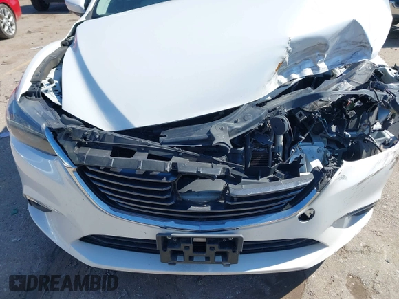 2016 Mazda 6 i Grand Touring with VIN JM1GJ1W57G1403028, listed as a IAAI auction lot 41591235 with 110,079 mi miles and . Bid and sale history available at carsss.com. Image 12.