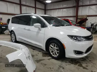 2020 Chrysler Pacifica Touring L with VIN 2C4RC1BGXLR128514, listed as a Copart auction lot 57333635 with 71,109 mi miles and Salvage title. Bid and sale history available at DreamBid. Image 4.