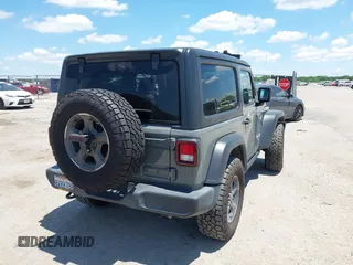 2021 Jeep Wrangler Sport S z VIN 1C4HJXAG8MW569220, wystawiony jako IAAI lot #42213316 z przebiegiem 41 284 mil mil oraz . Historia ofert i sprzedaży dostępna na DreamBid. Obrazek 4.