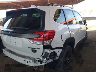 2022 Subaru Forester Wilderness with VIN JF2SKAMC3NH401355, listed as a IAAI auction lot 42510482 with 58,279 mi miles and . Bid and sale history available at DreamBid. Image 4.