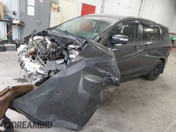 2014 Mazda 5 Sport z VIN JM1CW2BLXE0164748, wystawiony jako IAAI lot #42064606 z przebiegiem 140 169 mil mil oraz . Historia ofert i sprzedaży dostępna na DreamBid. Obrazek 2.