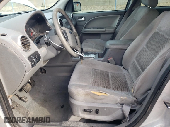 2005 Ford Freestyle SEL z VIN 1FMDK05165GA15433, wystawiony jako Copart lot #87221574 z przebiegiem Nie podano mil oraz Szkoda całkowita • Salvage title. Historia ofert i sprzedaży dostępna na DreamBid. Obrazek 7.