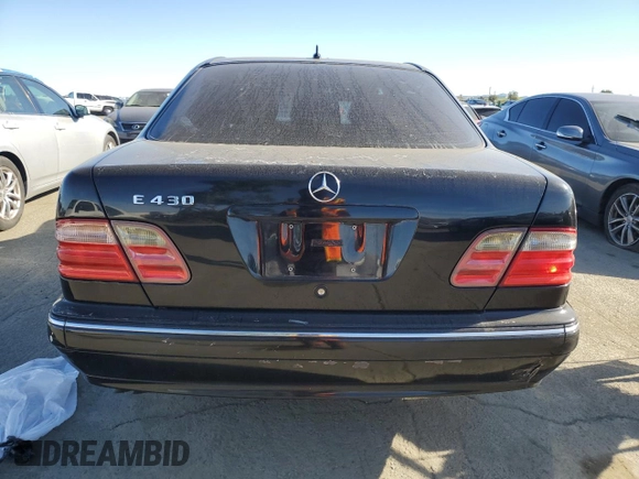 2001 Mercedes-Benz E-Class with VIN WDBJF70JX1B327997, listed as a Copart auction lot 87650175 with 268,045 mi miles and Salvage Title. Bid and sale history available at carsss.com. Image 6.