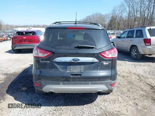 2014 Ford Escape Titanium with VIN 1FMCU9JX2EUA96338, listed as a IAAI auction lot 41806850 with 127,745 mi miles. Bid and sale history available at carsss.com. Image 16.