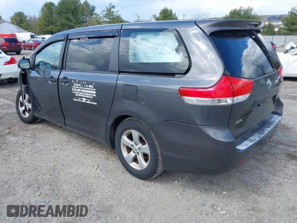 2014 Toyota Sienna L with VIN 5TDZK3DC4ES407928, listed as a IAAI auction lot 41887349 with 208,289 mi miles. Bid and sale history available at carsss.com. Image 3.
