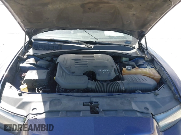 2013 Dodge Charger SE with VIN 2C3CDXBG7DH617857, listed as a IAAI auction lot 41837168 with 158,699 mi miles and . Bid and sale history available at DreamBid. Image 10.