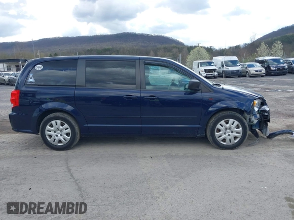 2016 Dodge Grand Caravan SE with VIN 2C4RDGBG4GR146450, listed as a IAAI auction lot 42015145 with 128,725 mi miles. Bid and sale history available at carsss.com. Image 13.