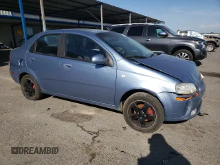 2006 Chevrolet Aveo LT with VIN KL1TG56676B528995, listed as a Copart auction lot 53152405 with 212,956 mi miles and Salvage title. Bid and sale history available at DreamBid. Image 4.