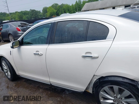 2013 Lincoln MKS with VIN 1LNHL9DK6DG600928, listed as a IAAI auction lot 42502424 with 194,015 mi miles and . Bid and sale history available at DreamBid. Image 14.