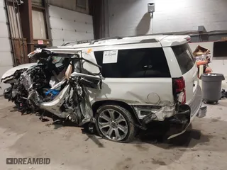 2017 Chevrolet Suburban Premier with VIN 1GNSKJKC6HR402877, listed as a IAAI auction lot 41422660 with 117,736 mi miles. Bid and sale history available at carsss.com. Image 13.