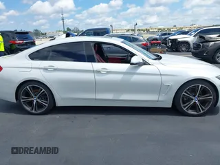 2018 BMW 4 Series 430i with VIN WBA4J1C5XJBG78451, listed as a IAAI auction lot 42256036 with 103,289 mi miles and . Bid and sale history available at DreamBid. Image 14.