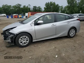 2021 Toyota Prius L Eco z VIN JTDKAMFU3M3133024, wystawiony jako Copart lot #58367655 z przebiegiem 90 375 mil mil oraz Szkoda całkowita • Salvage title. Historia ofert i sprzedaży dostępna na DreamBid. Obrazek 1.