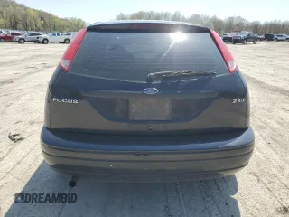 2005 Ford Focus S z VIN 3FAFP31N65R153304, wystawiony jako Copart lot #54253215 z przebiegiem 148 707 mil mil oraz Szkoda całkowita • Salvage title. Historia ofert i sprzedaży dostępna na DreamBid. Obrazek 6.