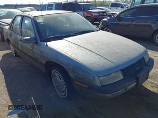 1992 Chevrolet Corsica LT z VIN 1G1LT53T9NY154246, wystawiony jako IAAI lot #41834072 z przebiegiem 87 587 mil mil oraz . Historia ofert i sprzedaży dostępna na DreamBid. Obrazek 1.