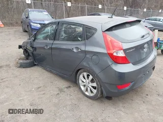 2013 Hyundai Accent SE with VIN KMHCU5AE1DU091931, listed as a IAAI auction lot 41783034 with 72,732 mi miles. Bid and sale history available at carsss.com. Image 3.