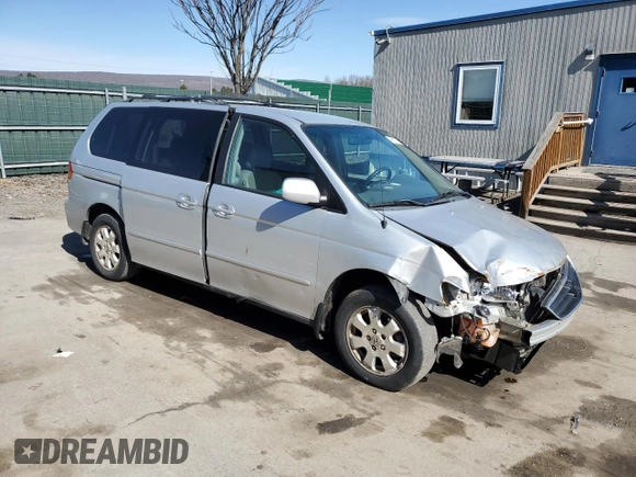 2004 Honda Odyssey EX-L with VIN 5FNRL18994B117140, listed as a Copart auction lot 49677635 with 247,237 mi miles and Salvage Title. Bid and sale history available at DreamBid. Image 4.