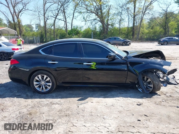 2012 Infiniti M with VIN JN1BY1AR1CM392880, listed as a IAAI auction lot 42012317 with 106,000 mi miles and . Bid and sale history available at DreamBid. Image 12.