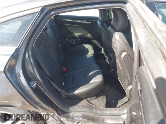 2016 Ford Fusion Titanium Hybrid с VIN 3FA6P0RU8GR266488, выставлен на аукционе IAAI как лот 41903919 с пробегом 74 927 миль миль и . История ставок и продаж доступна на DreamBid. Изображение 8.