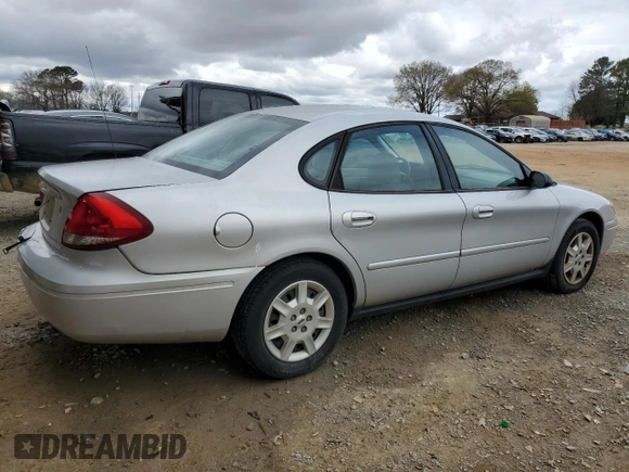 2005 Ford Taurus SE with VIN 1FAFP53U75A183941, listed as a Copart auction lot 49733785 with 82,829 mi miles and Salvage Title. Bid and sale history available at carsss.com. Image 3.