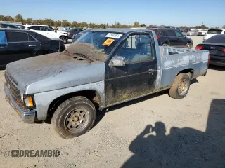 1991 Nissan Frontier XE with VIN 1N6SD11S1MC391910, listed as a Copart auction lot 77504394 with 260,280 mi miles and Clean title. Bid and sale history available at DreamBid. Image 1.